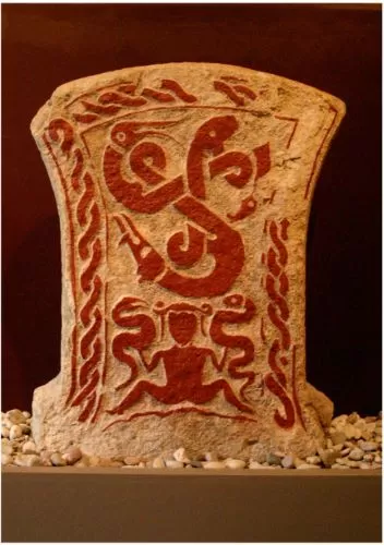 Nar Smith III Runestone from Gotland featuring a woman (?) holding two serpentine dragons, c. 400-600 CE